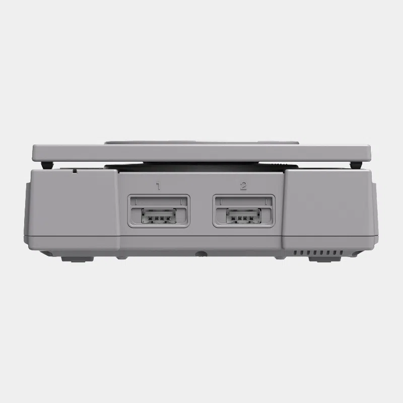 Boîtier Retroflag PiStation gris vu de profil avec ports manettes 1 et 2