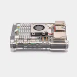 Boîtier Pibow transparent pour Raspberry Pi 4 avec ventilateur intégré, vu de profil avec ports USB et Ethernet visibles