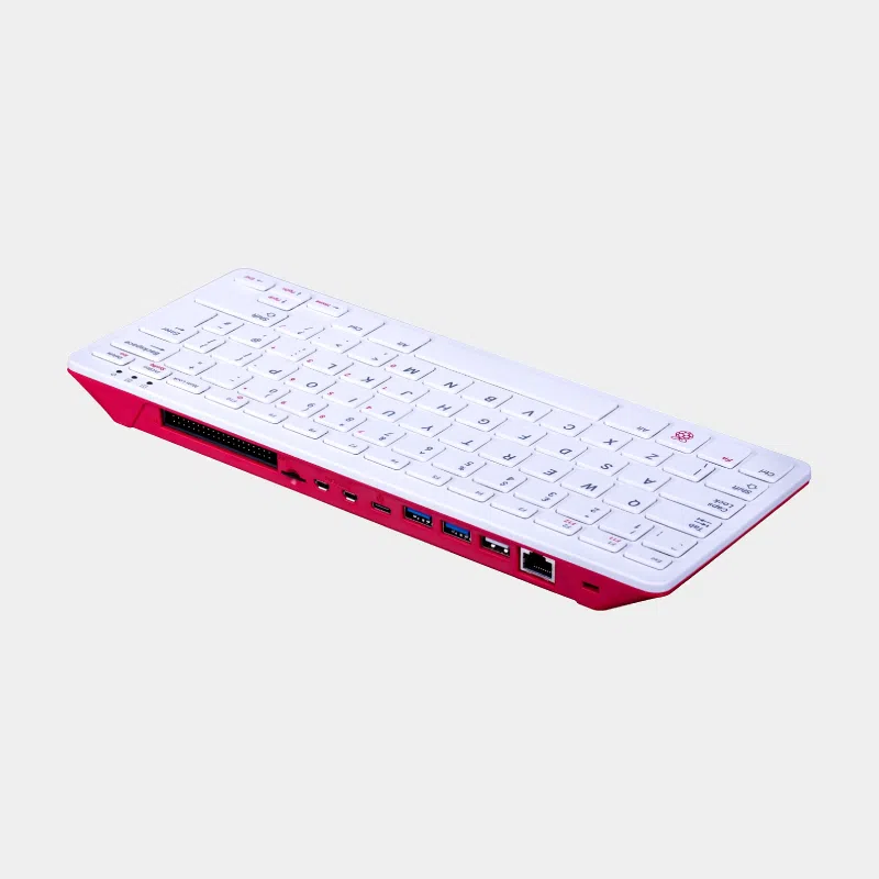 Raspberry Pi 400, clavier ordinateur blanc et rouge vu de dessus en angle