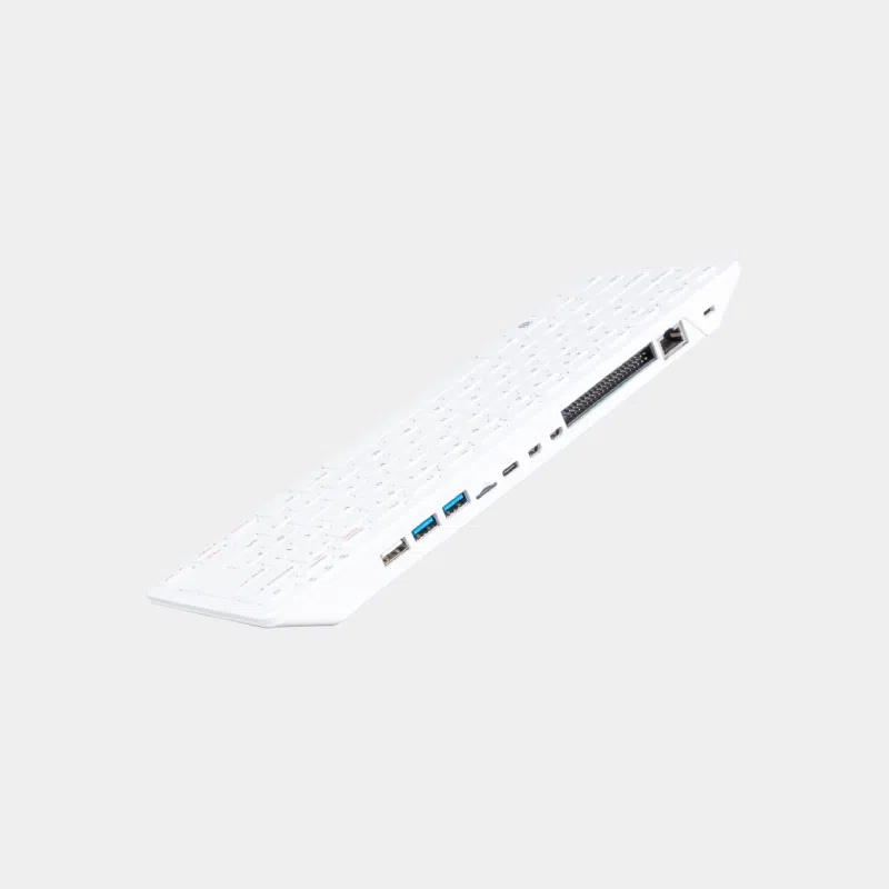 Clavier Raspberry Pi 500 vu de profil avec ports USB et Ethernet sur la tranche