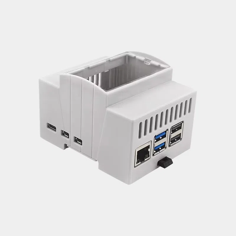 Boîtier rail DIN pour Raspberry Pi 5 fixé sur un profilé, ports Ethernet et USB visibles