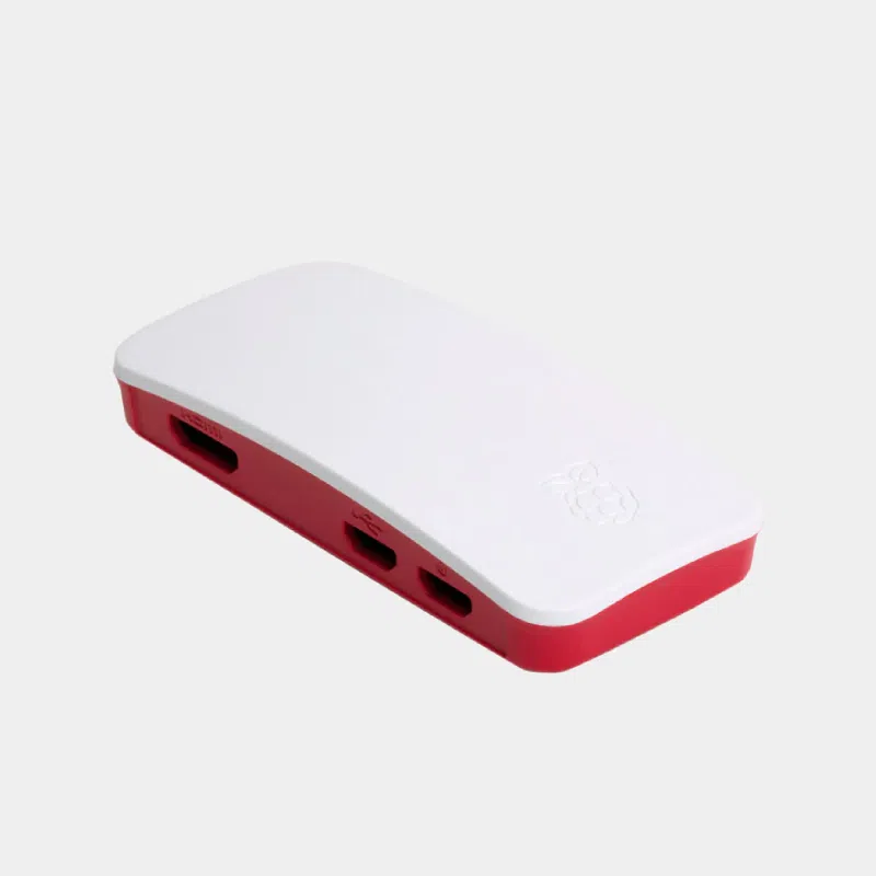 Boîtier officiel Raspberry Pi Zero rouge et blanc assemblé, vu de biais