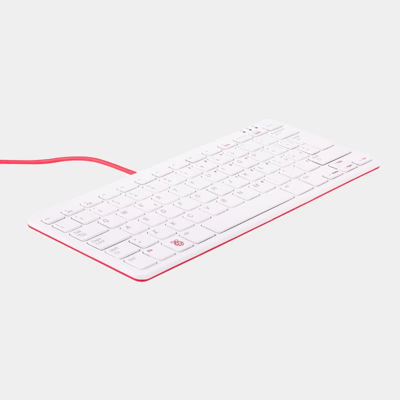 Clavier officiel Raspberry Pi azerty blanc et rouge vu de biais avec câble rouge