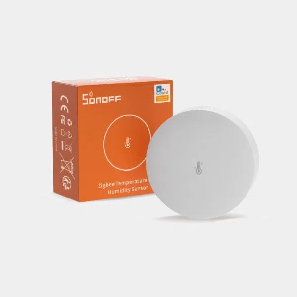 Capteur de température et d'humidité Zigbee Sonoff blanc posé devant son emballage orange