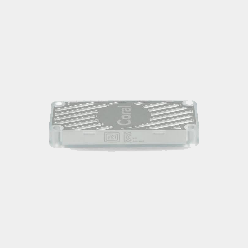 Accélérateur Google Coral USB gris vu de dessus avec logo Coral